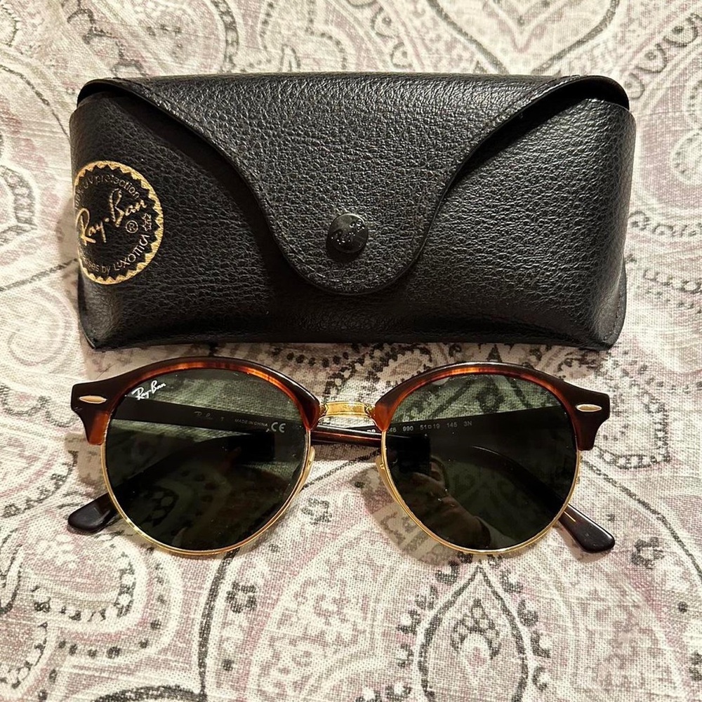 Ray bans! Green lenses, brown features.